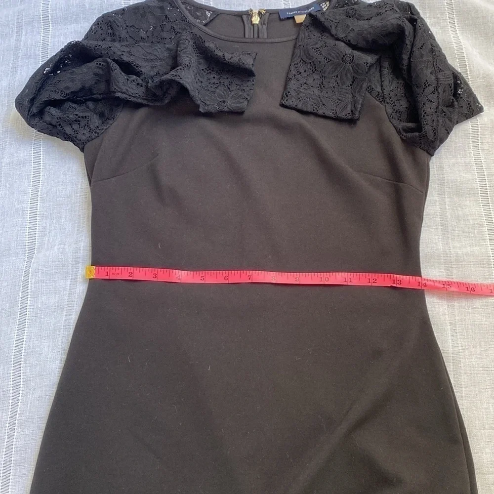 Tommy Hilfiger little black dress with long sleeves lace sleeves.